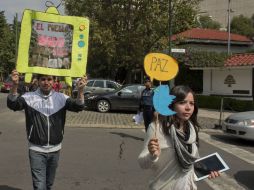 Integrantes de #YoSoy132 consideran que hubo irregularidades en la elección, como la compra de votos, vandalismo y quema de urnas. AFP  /