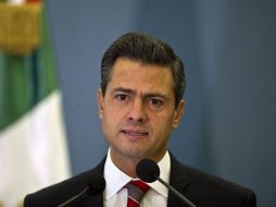 Peña Nieto invita a los legisladores a trabajar en conjunto para aprobar reformas. AFP  /