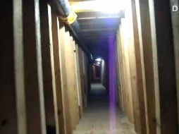 El túnel de Sonora  cuenta con con iluminación, un sistema de ventilación y paredes, techo y suelo reforzados con madera. AFP  /