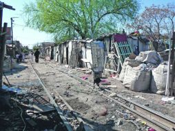 ZONA MARGINAL. Los deseos de urbanización de las “Villas miseria” contrastan con las imágenes que ahí se captan. ESPECIAL  /