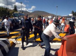 El 12 de diciembre de 2011 dos normalistas de Ayotzinapa murieron tras un enfrentamiento con policías en la autopista del Sol. ARCHIVO  /