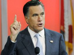 Romney reiteró que dejó Bain Capital en 1999 y exigió a la campaña demócrata que ponga fin a las acusaciones. AP  /