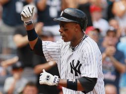 Curtis Granderson festeja su vuelacercas 24 de la temporada. AFP  /