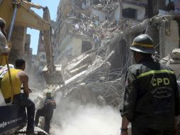 Informes oficiales reportan que el edificio destruido ya tenía la orden de ser demolido, pero no se cumplió. AP  /