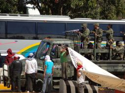El 12 de diciembre de 2011, una marcha de normalistas de Ayotzinapa derivó en el bloqueo de la Autopista del Sol. ARCHIVO  /