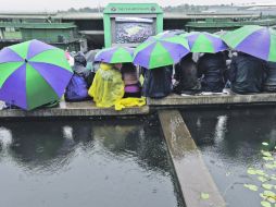 PARAGUAS. Desde Wimbledon existe el problema. AP  /