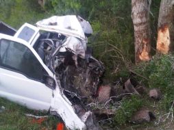 Fotografía del lugar del accidente con los restos del vehículo siniestrado. REUTERS  /