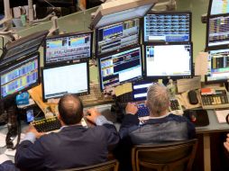 El tecnológico Nasdaq perdía 52 unidades para quedar en 2 mil 873. AP  /