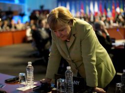 Aumenta la presión sobre la canciller Angela Merkel, ante la posible salida de Grecia del euro. ARCHIVO  /