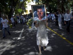 Oswaldo Payá fue sepultado en La Habana en medio del dolor y consternación de sus correligionarios. AP  /