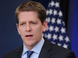 Jay Carney dió el comunicado a los periodistas a bordo del Air Force One. ARCHIVO  /