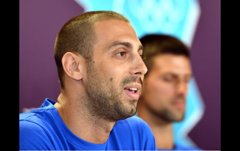 Miroslav Cavic piensa que ninguna compañía inmiscuida en los Olímpicos, debe tener intereses creados en un atleta. AFP  /