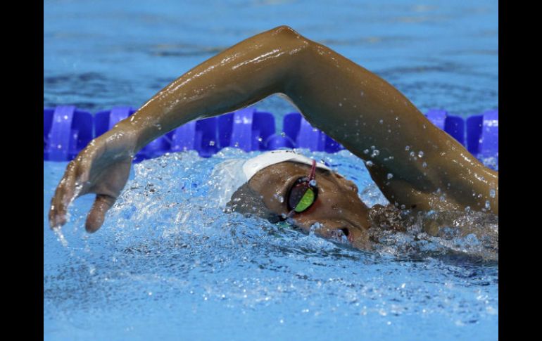 Los nadadores están siendo afectados por el calor en los entrenamientos, dicen entrenadores. AP  /