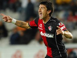 Héctor Mancilla se reconcilia con su afición al dar un gran partido ante los Tuzos. XINHUA  /