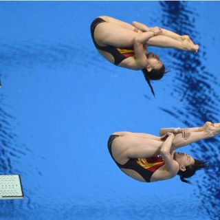 China gana oro en trampolín
