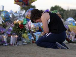 Comunidad de Denver, Colorado, recordando el tiroteo presentado en el estreno de la nueva película de Batman en Aurora. AFP  /