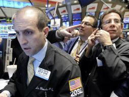 Se mantienen a la espera de la reunión entre la Fed y el BCE. AP  /