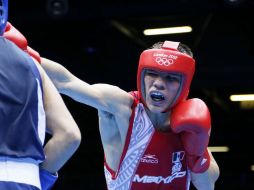 El pugilista mexicano está a un solo combate de la medalla de bronce. AFP  /