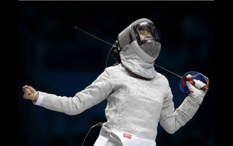 La surcoreana celebra gloriosa su victoria. AP  /