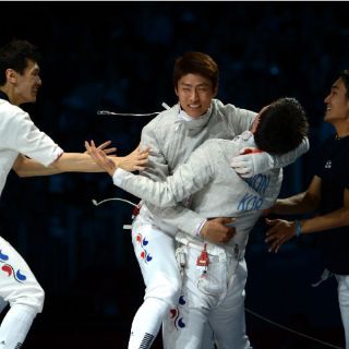 Oro para Corea del Sur en sable