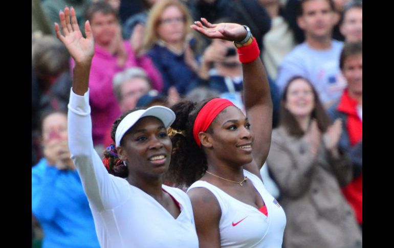 Venus y Serena cerraron el partido en una hora y 33 minutos. AFP  /