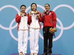 Laura Sanchez (D)  conquistó la medalla de bronce en la prueba de trampolín de tres metros. REUTERS  /