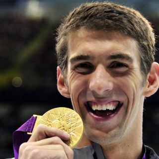 Bolt impresiona a Phelps