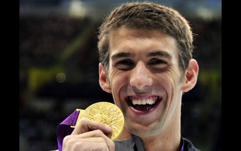 Phelps también ha sido alabado por el velocista, por sus ''muchos oros''. REUTERS  /