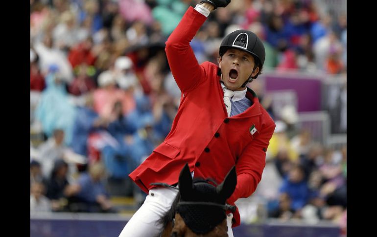 Montando a ''Rosalía La Silla'', Michán finaliza en el puesto 22 de la tercera ronda clasificatoria y luchará por medallas. AP  /