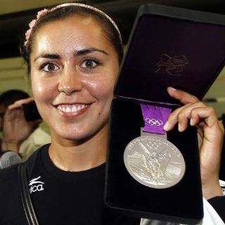 Román vuelve satisfecha a México