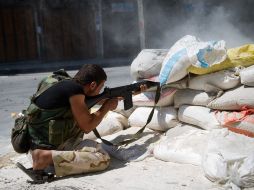 La batalla por la ciudad siria de Alepo se prolongó con duros enfrentamientos entre el Ejército y los rebeldes. AFP  /