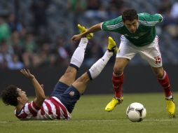 Héctor Moreno (der.) en una acción del partido del pasado miércoles antes EU. XINHUA  /