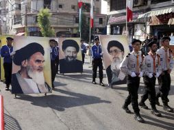 Simpatizantes de Hezbolá marchan para mostrar su rechazo ante las amenzas de Israel. AP  /