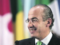 Hasta en la Fórmula 1. La promoción del país como marca se puede ver en el auto de Sergio Pérez. REUTERS  /