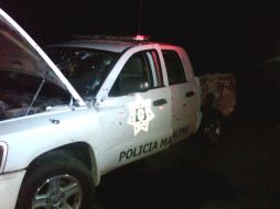 Agentes de distintas dependencias de seguridad apoyan en el municipio, en la imagen patrulla baleada de la policía de Magdalena.  /