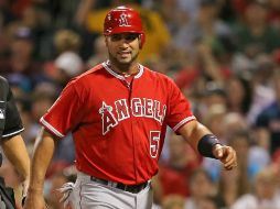 Pujols hizo trabajos de recuperación con el preparador físico durante varias horas. AFP  /