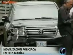 La camioneta recibió al menos 30 disparos de armas de distinto calibre. Imagen tomada de la TV. ESPECIAL  /