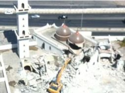 Imagen que muestra la demolición de un mausoleo musulmán. ESPECIAL  /