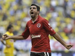 Cristian Pellerano anotó un golazo para darle el triunfo al América. EFE  /