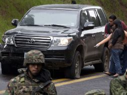 Los 12 policías fueron detenidos por haber presuntamente disparado contra un vehículo diplomático. AP  /