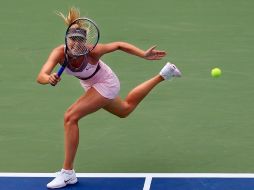 La rusa Sharapova hizo valer su condición de tercera favorita. AFP  /