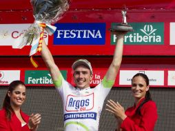 Degenkolb celebrando su victoria en la décima vuelta de la competencia. AP  /