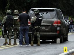 La Semar aclara que el capitán se encontraba en el asiento trasero pidiendo auxilio por su teléfono. ARCHIVO  /