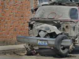 Los integrantes de la banda fueron sorprendidos mientras desmantelaban un automóvil. ARCHIVO  /