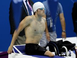 El nadador mexicano admitió emocionado que no se esperaba un registro tan bajo. ARCHIVO  /