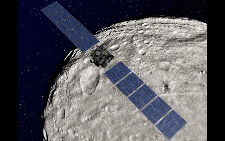 En la imagen, Dawn de la NASA en órbita alrededor de Vesta el asteroide gigante. AP  /