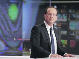 El ''Acercamiento''. Desde un programa de televisión, el presidente francés habló sobre el plan anticrisis. REUTERS  /