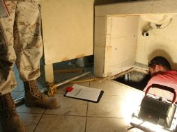 El corredor con instalaciones eléctricas, ventilación y carritos para transporte de paquetes, era utilizado para cruzar droga. ARCHIVO  /