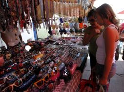 En la capital del país casi uno de cada tres ocupados está en la informalidad, lo cual se refleja en menor ingreso. ARCHIVO  /