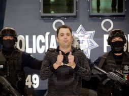 Ramiro Pozos González lució desafiante ante las cámaras durante su presentación. AFP  /